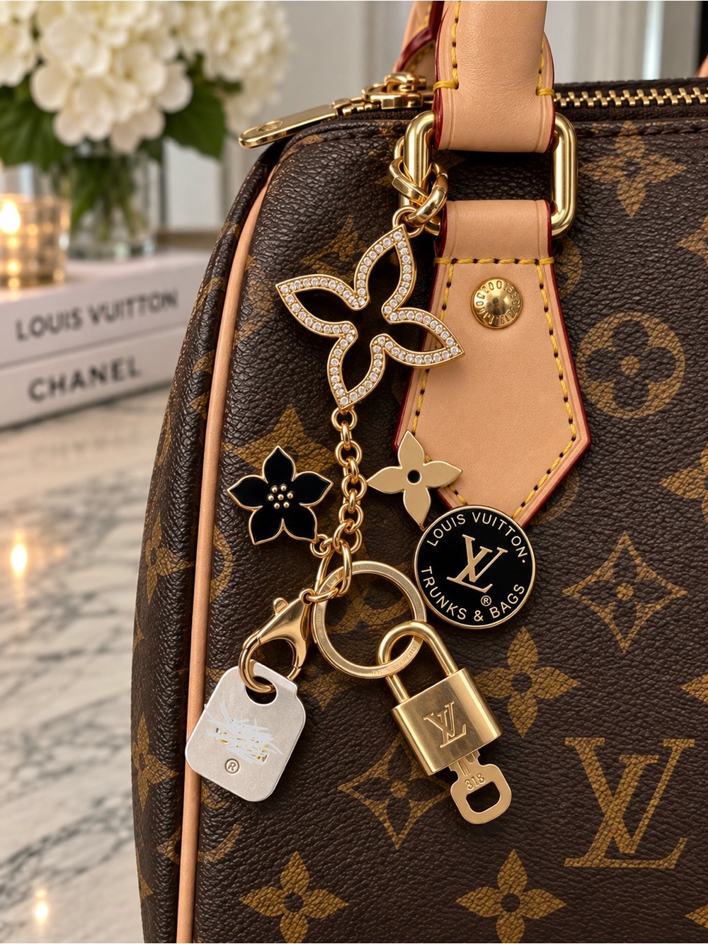 LV lock and button charm with keychain